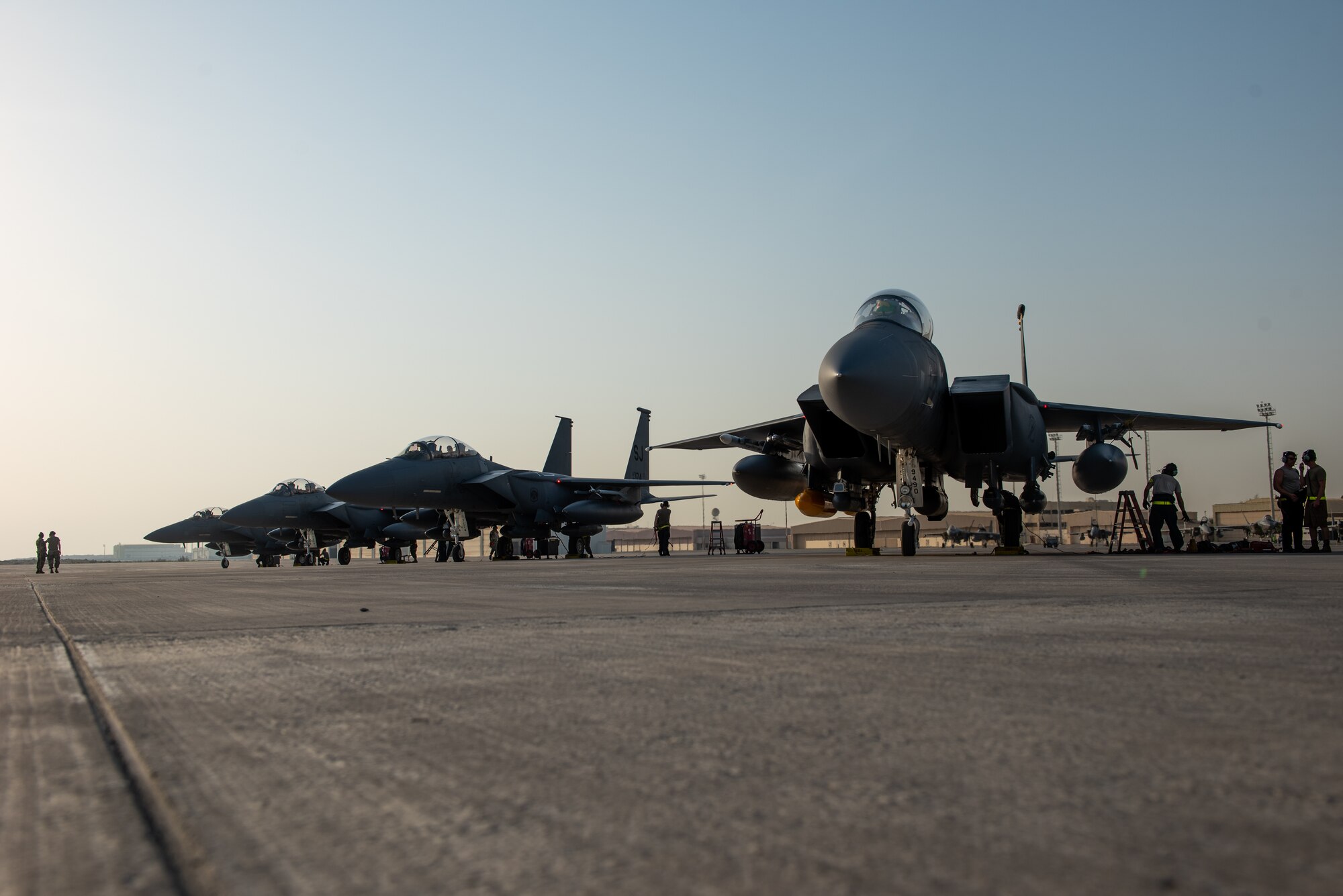 Four F-15E Strike Eagles from the 4th Fighter Wing, Seymour Johnson Air Force Base, North Carolina, park at Al Dhafra Air Base, United Arab Emirates, June 13, 2019. The F-15Es joined ADABs inventory of other fighters to include F-15C Eagles and F-35A Lightning IIs. (U.S. Air Force photo by Staff Sgt. Chris Thornbury)