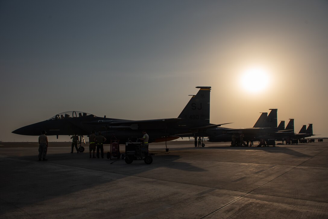 Four F-15E Strike Eagles from the 4th Fighter Wing, Seymour Johnson Air Force Base, North Carolina, park at Al Dhafra Air Base, United Arab Emirates, June 13, 2019. The F-15Es joined ADABs inventory of other fighters to include F-15C Eagles and F-35A Lightning IIs. (U.S. Air Force photo by Staff Sgt. Chris Thornbury)