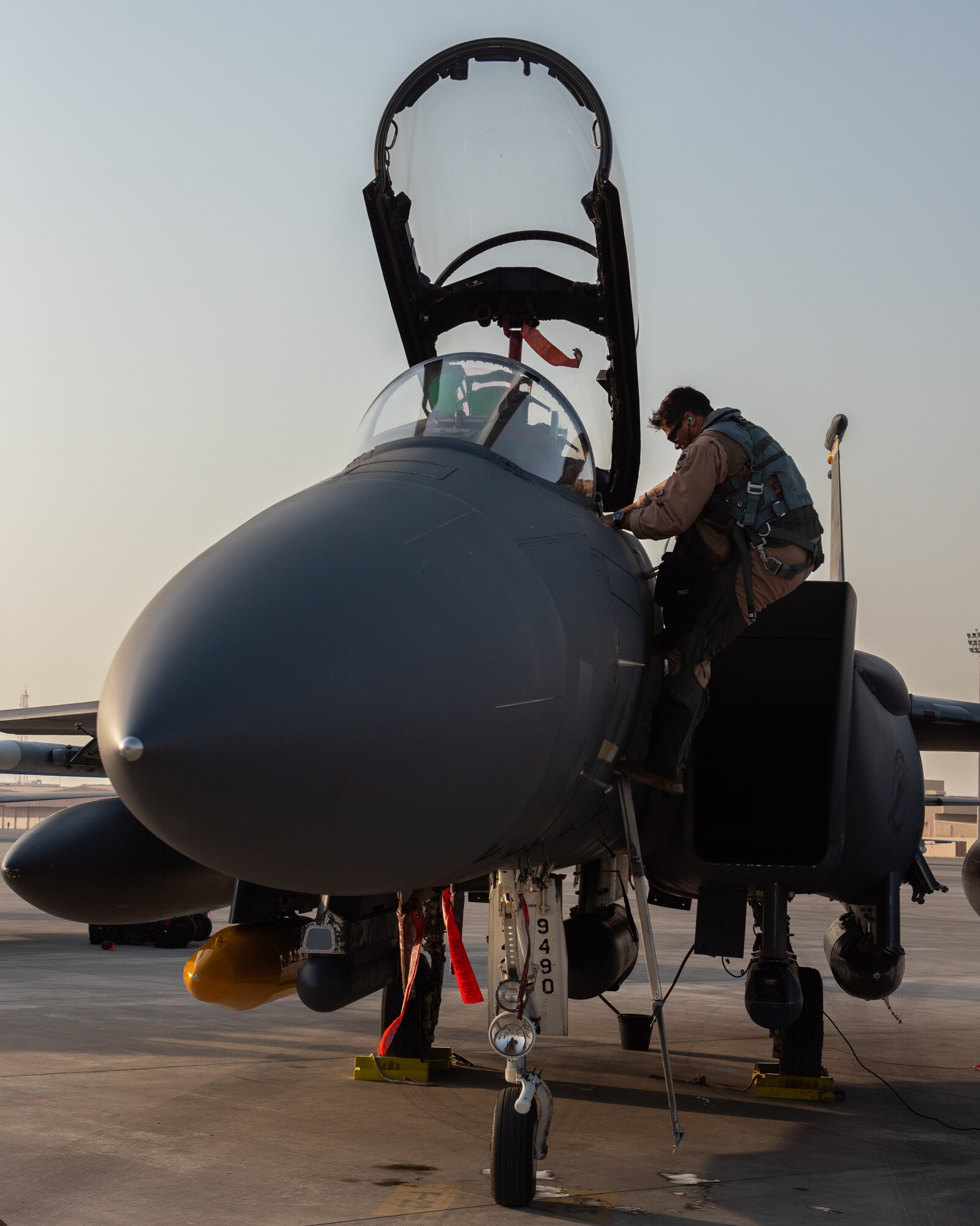 Maintainers newly assigned to the 380th Expeditionary Aircraft Maintenance Squadron, assist pilots arriving from the 336th Fighter Squadron, June 13, 2019, at Al Dhafra Air Base, United Arab Emirates. The aircrew and maintainers deployed from the 4th Fighter Wing at Seymour Johnson Air Force Base, North Carolina, to join Team ADAB’s diverse inventory of air power. (U.S. Air Force photo by Staff Sgt. Chris Thornbury)