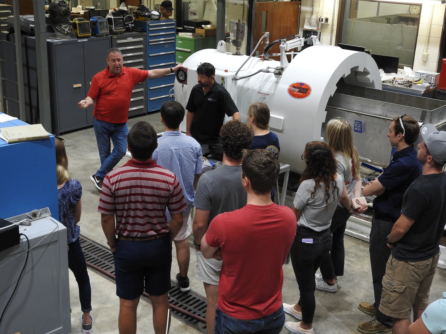 Naval Research Enterprise Internship Program (NREIP) interns toured Naval Surface Warfare Center Panama City Division's (NSWC PCD) various facilities to learn more about the opportunities to work with many projects and mission areas at NSWC PCD June 13.