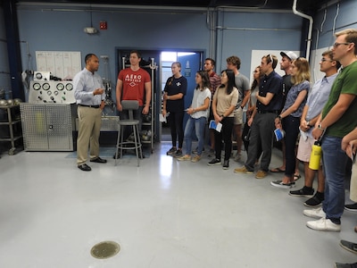 Naval Research Enterprise Internship Program (NREIP) interns toured Naval Surface Warfare Center Panama City Division's (NSWC PCD) various facilities to learn more about the opportunities to work with many projects and mission areas at NSWC PCD June 13.