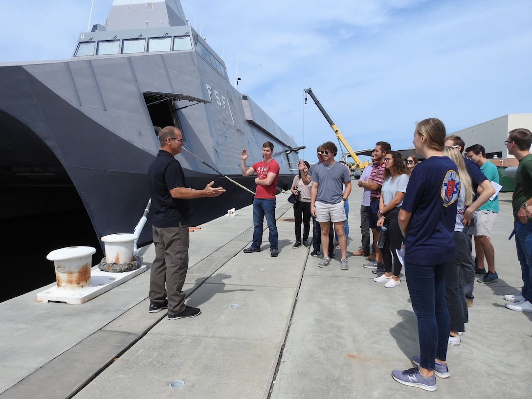 Naval Research Enterprise Internship Program (NREIP) interns toured Naval Surface Warfare Center Panama City Division's (NSWC PCD) various facilities to learn more about the opportunities to work with many projects and mission areas at NSWC PCD June 13.