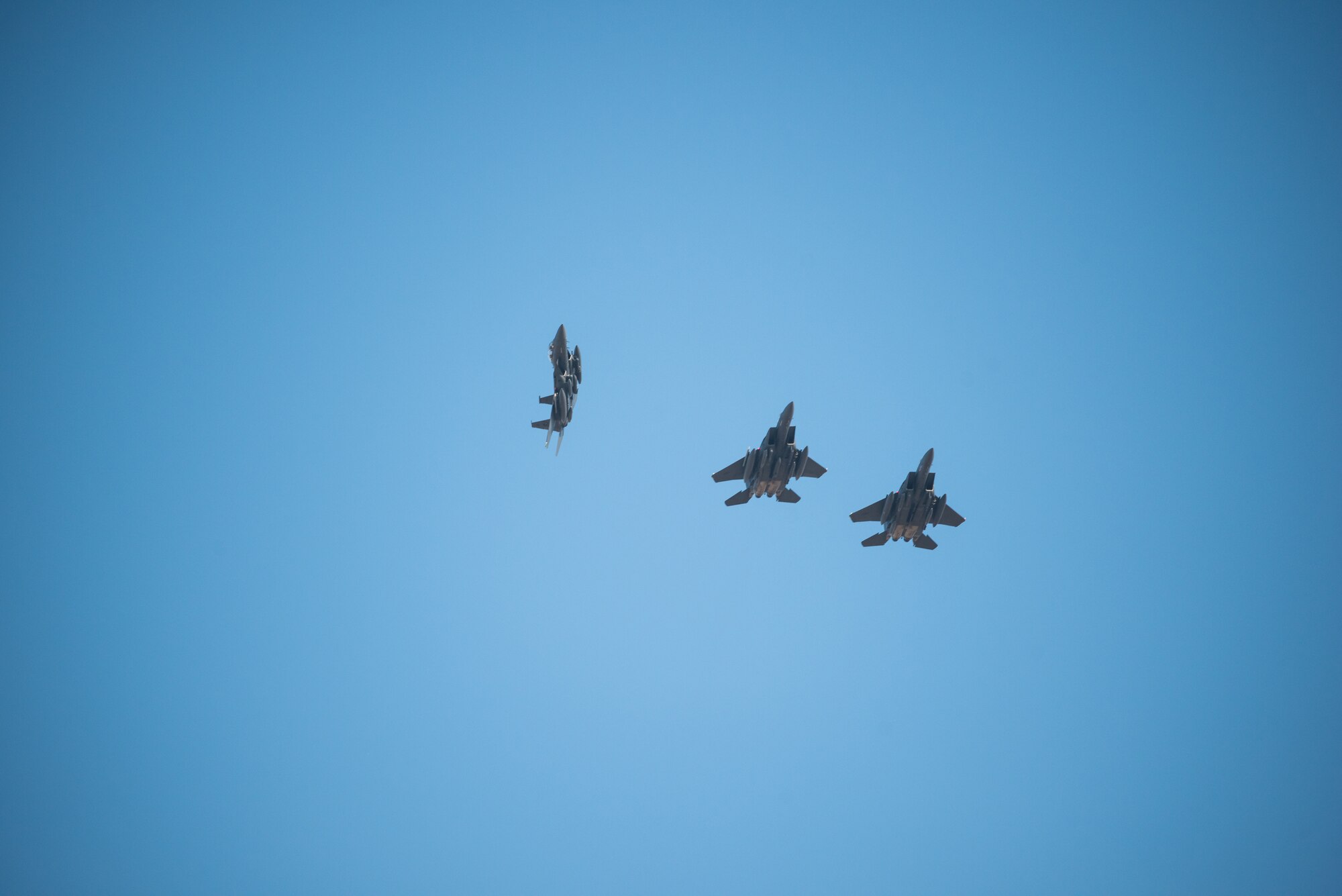 Three F-15E Strike Eagles from the 336th Fighter Squadron, 4th Fighter Wing at Seymour Johnson Air Force Base, North Carolina prepare to land at Al Dhafra Air Base, United Arab Emirates, June 14, 2019. The F-15E’s joined ADABs inventory of other fighters to include F-15C Eagles and F-35A Lightning IIs. (U.S. Air Force photo by Staff Sgt. Chris Thornbury)