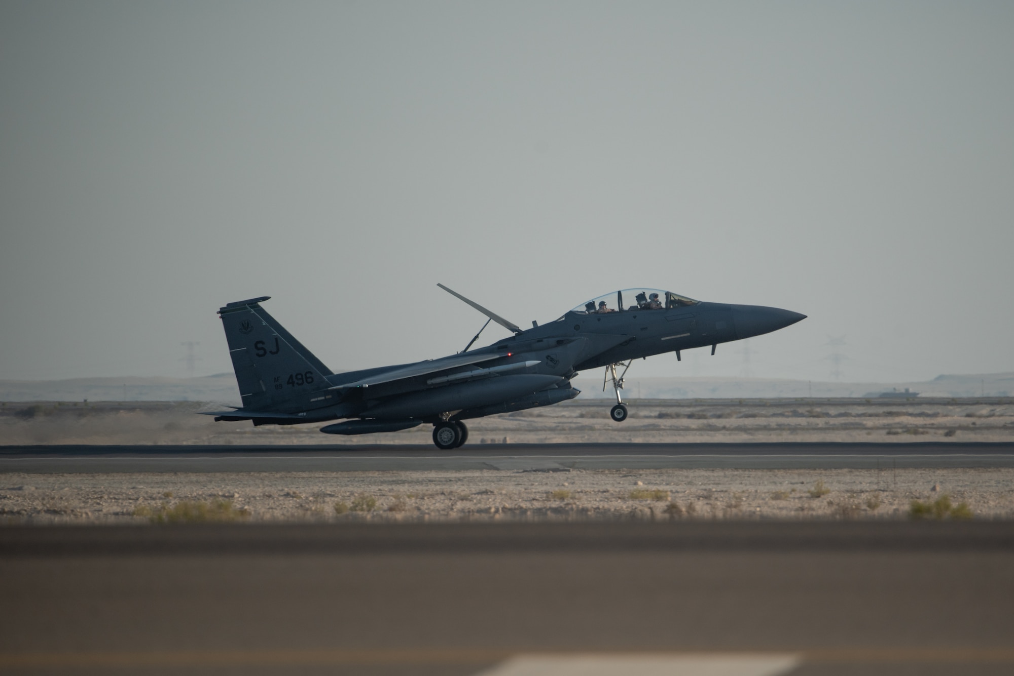 An F-15E Strike Eagle deployed from the 4th Fighter Wing at Seymour Johnson Air Force Base, North Carolina, lands at Al Dhafra Air Base, United Arab Emirates, June 14, 2019. F-15E’s are designed to perform in air-to-air and air-to ground operations in any environment. (U.S. Air Force photo by Staff Sgt. Chris Thornbury)