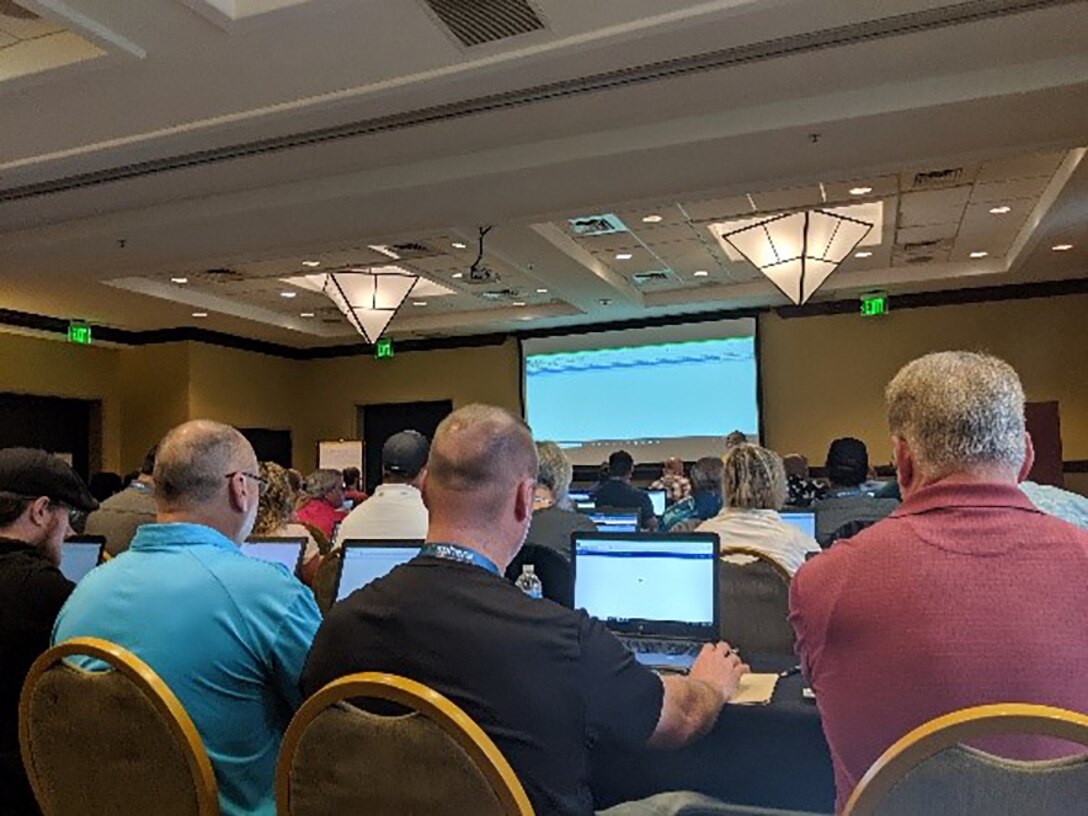 Environmental protection specialists listen during training on the Hazardous Material Management System-Hazardous Waste Disposal currently being deployed to DLA Disposition Services sites.