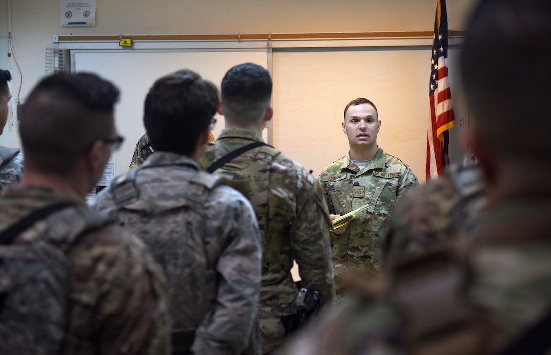 Master Sgt. Michael Alberti, 39th Security Forces Squadron Delta Flight chief, briefs Airmen during guard mount April 4, 2019, at Incirlik Air Base, Turkey. Guard mount takes place prior to Airmen reporting to their assigned post for their shift and gives flight leadership the opportunity to pertinent information. (U.S. Air Force photo by Staff Sgt. Trevor Rhynes)