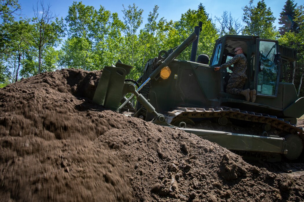 U.S. Marines with MWSS-471 build a roadway at Canadian Forces Base Cold Lake
