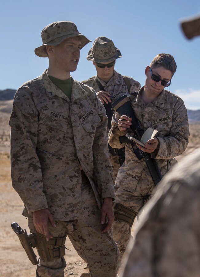 U.S. Marine Private First Class Kenneth Scott, a military policeman with Marine Wing Support Squadron 472, Marine Aircraft Group 49, 4th Marine Aircraft Wing teaches a class about weapons operations on Range 106 during Integrated Training Exercise 4-19 at Marine Corps Air Ground Combat Center Twentynine Palms, Calif., June 13, 2019. ITX measures the ability to provide a cohesive, trained and ready capability in support of service and Combatant Commander requirements. (U.S. Marine Corps photo by Cpl. Tessa D. Watts)
