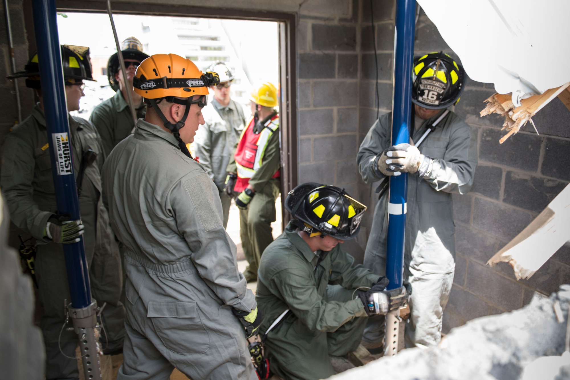 Firefighter’s with the 167th Airlift Wing, Martinsburg, WV, practice proper shoring techniques to prevent structural collapse of a building during June 2019 Super Drill.  The drill incorporated different facets of their job to include, responding to the location, scene size-up, simulated patient extraction and structural shoring (stabilization) techniques. (U.S. Air National Guard photo by Tech. Sgt. Michael Dickson)