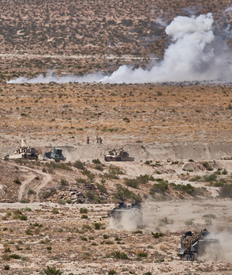 Assault amphibious vehicles with 4th Assault Amphibian Battalion, 4th Marine Division, moves up toward a breached obstruction during the mechanized assault course of Integrated Training Exercise 4-19 at Marine Corps Air Ground Combat Center, Twentynine Palms, Calif., June 12, 2019. The ITX force includes each of the Marine Air-Ground Task Force’s subordinate elements who work together in the application of combined-arms maneuver warfare during the exercise. (U.S. Marine Corps photo by Master Sgt. Robert Brown)
