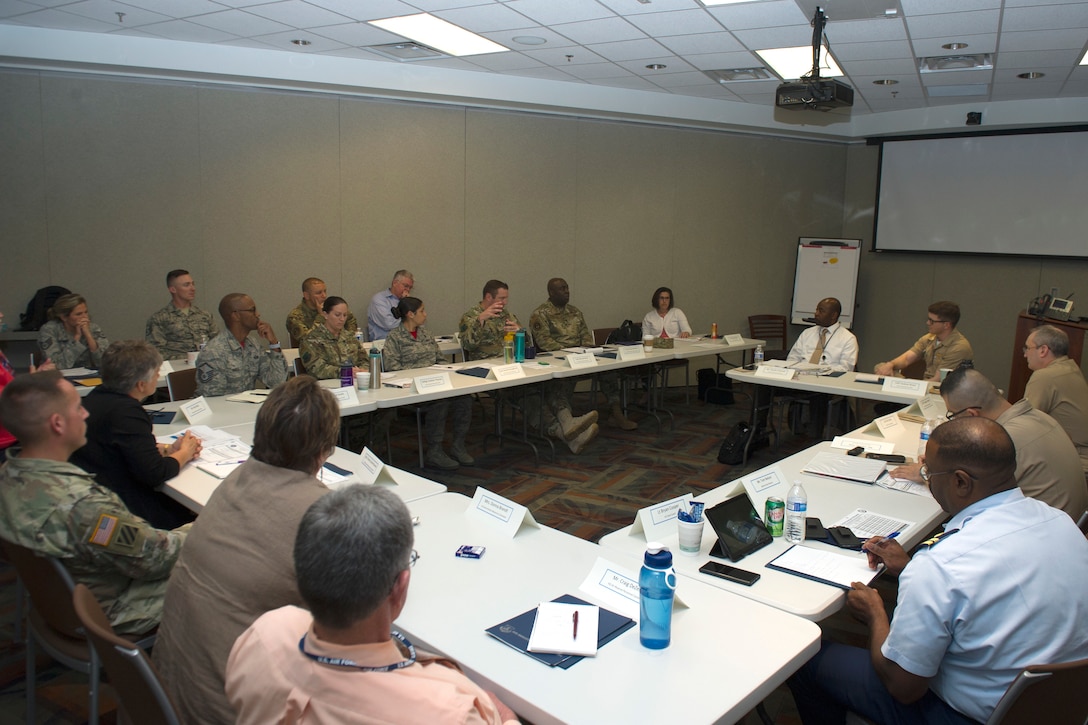 Joint service members and civilians discuss Individual Ready Reserve program topics during Day Two of the 2019 Joint IRR Conference, hosted by HQ Air Reserve Personnel Center, Buckley Air Force Base, Colorado, June 13-15, 2019.