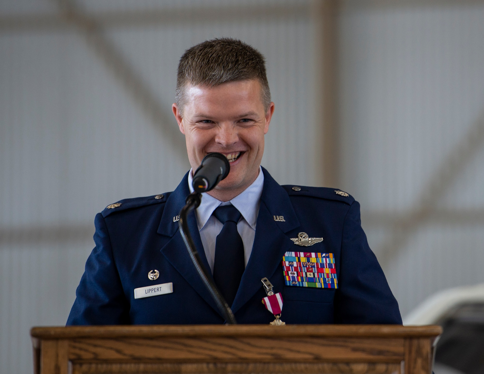 Lt. Col. Royce Lippert, 457th Airlift Squadron commander, speaks during the 457th AS inactivation ceremony at Joint Base Andrews, Maryland, June 14, 2019. Until June 14, the 457th AS flew distinguished visitor, medical evacuation, and Mission Capable missions throughout the western hemisphere. (U.S. Air Force photo by Senior Airman Chad Gorecki)