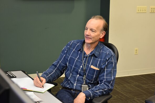 Mike Metzger, a system engineer at AEDC Hypervelocity Wind Tunnel 9 in White Oak, Maryland, works on a project. Metzger recently marked his 40-year service anniversary at the White Oak facility and is among the few people familiar with the Tunnel 9 heater system. (U.S. Air Force photo by A.J. Spicer)