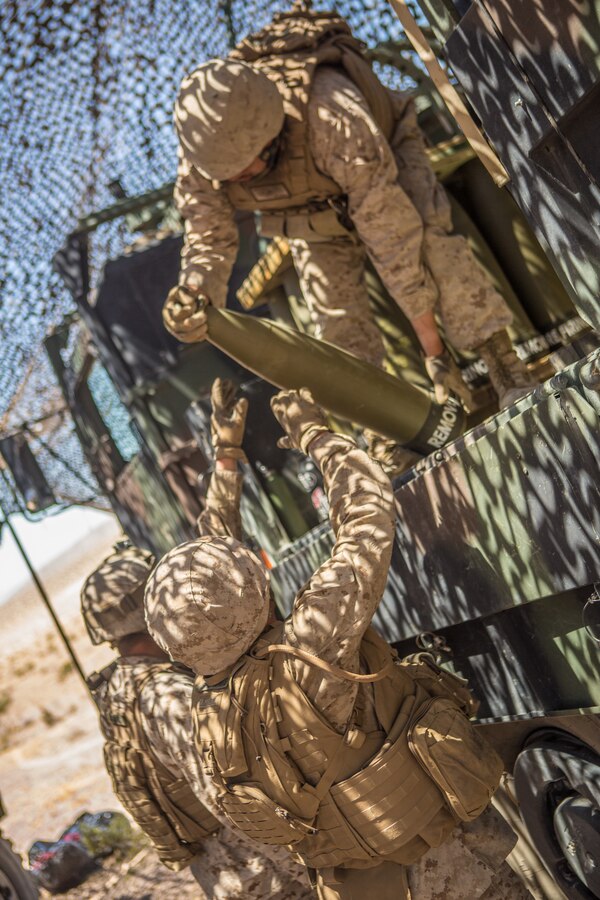U.S. Marines with November Battery, 5th Battalion, 14th Marine Regiment, 4th Marine Division, prepare 155mm artillery shells for a fire mission at Gays Pass during Integrated Training Exercise 4-19 at the Marine Corps Air Ground Combat Center, Twentynine Palms, Calif., June 14, 2019. Today’s Marine Reserve is a critical component of the Marine Corps’ Total Force, and training like ITX helps ensure Reserve units combat effectiveness and proficiency for world-wide deployment. (U.S. Marine Corps photo by Lance Cpl. Preston L. Morris)