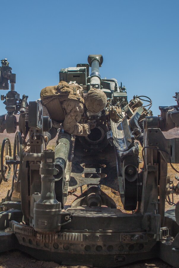 U.S. Marine Cpl. Russell Allen, a cannoneer with November Battery, 5th Battalion, 14th Marine Regiment, 4th Marine Division, checks the breach of an M777 howitzer before a fire mission at Gays Pass during Integrated Training Exercise 4-19 at the Marine Corps Air Ground Combat Center, Twentynine Palms, Calif., June 14, 2019. The ITX force includes each of the Marine Air-Ground Task Force’s subordinate elements who work together in the application of combined-arms maneuver warfare during the exercise. (U.S. Marine Corps photo by Lance Cpl. Preston L. Morris)