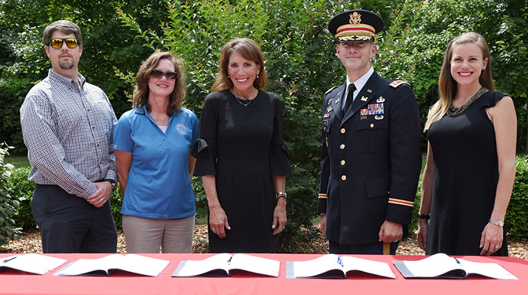 (Left to Right) Lance Wagner, Gallatin Stormwater Utility manager; Jennifer Watson, Gallatin Stormwater coordinator; Gallatin Mayor Paige Brown; Lt. Col. Cullen Jones, U.S. Army Corps of Engineers Nashville District commander; and Lacey Thomason, Nashville District project manager; participate in a project partnership agreement signing June 14, 2019 at Triple Creek Park in Gallatin, Tenn. The agreement clears the way for the Corps of Engineers to enter into the design and implementation phase for a flood risk reduction project to help alleviate flooding during periods of heavy rain. (USACE photo by Lee Roberts)