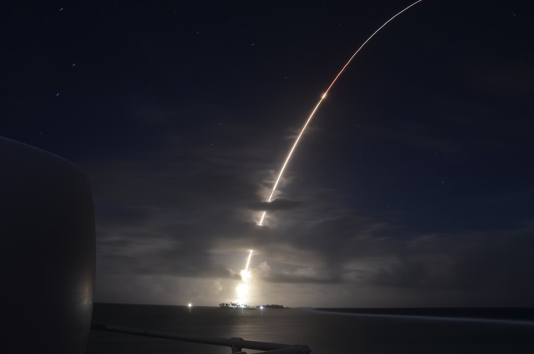 A threat-representative ICBM target launches from the Ronald Reagan Ballistic Missile Defense Test Site on Kwajalein Atoll in the Republic of the Marshall Islands on March 25. It was successfully intercepted by two long-range Ground-based Interceptors launched from Vandenberg Air Force Base, California, in the first salvo test of GBIs. (Courtesy photo/Missile Defense Agency)