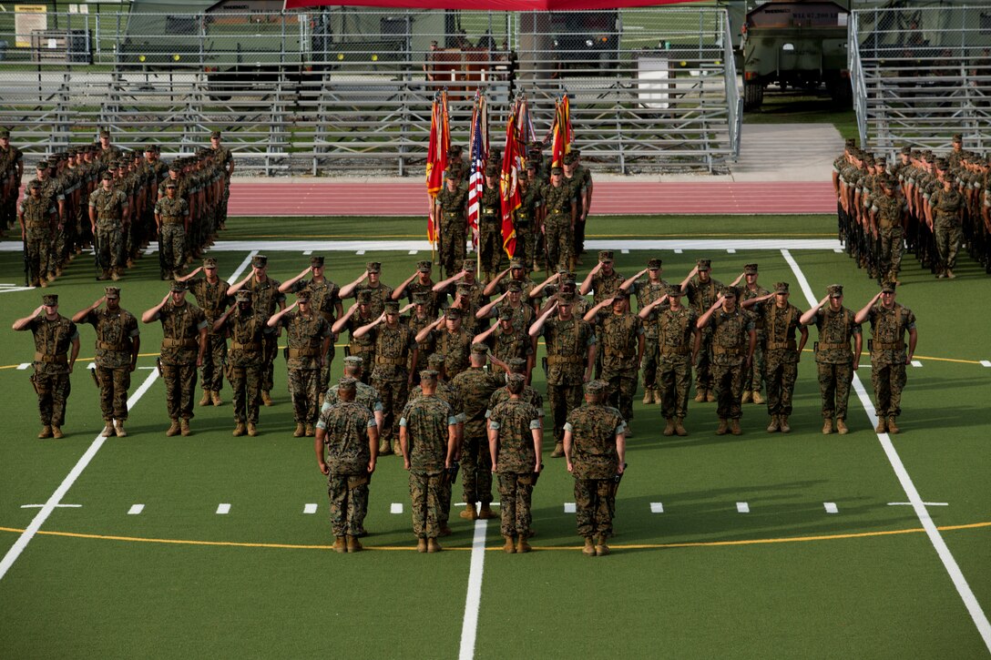 U.S. Marines with II Marine Expeditionary Force stand in formation during the II MEF change of command ceremony at Camp Lejeune, N.C., July 13, 2019. During the ceremony, Lt. Gen. Robert F. Hedelund relinquished his post as commanding general of II MEF to Lt. Gen. Brian D. Beaudreault. (U.S. Marine Corps photo by Lance Cpl. Nicholas Guevara)