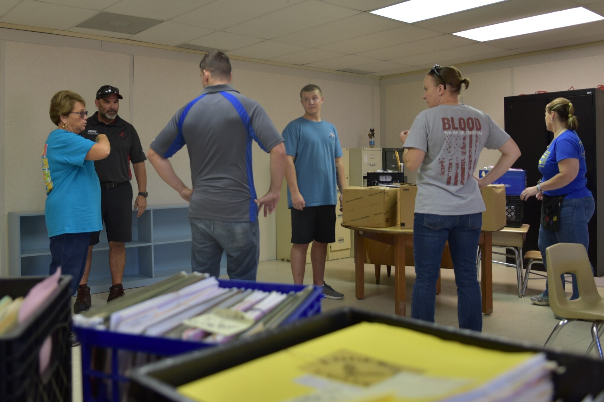 Wendy Hooks, Meadow Lane Elementary School Principal, right, explains the moving plan to Airmen assigned to Seymour Johnson Air Force Base and locals June 14, 2019, in Goldsboro, North Carolina.