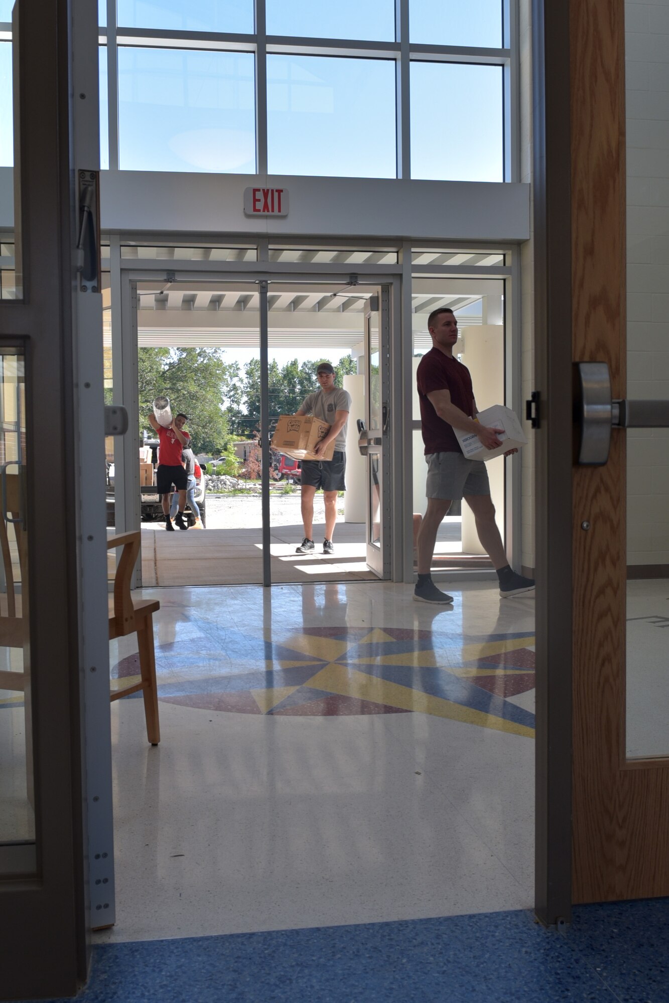 Airmen assigned to Seymour Johnson Air Force Base assist with moving equipment into the newly constructed Meadow Lane Elementary School June 14, 2019, in Goldsboro, North Carolina.