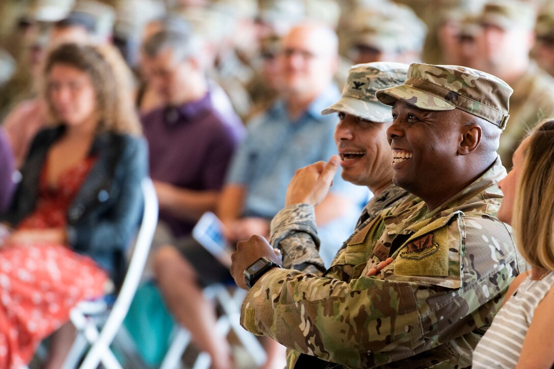 Wing leadership share a laugh during a change of command ceremony, June 17, 2019, at Moody Air Force Base, Ga. The ceremony is a military tradition that represents a formal transfer of a unit’s authority and responsibility from one commander to another. (U.S. Air Force photo by Senior Airman Erick Requadt)