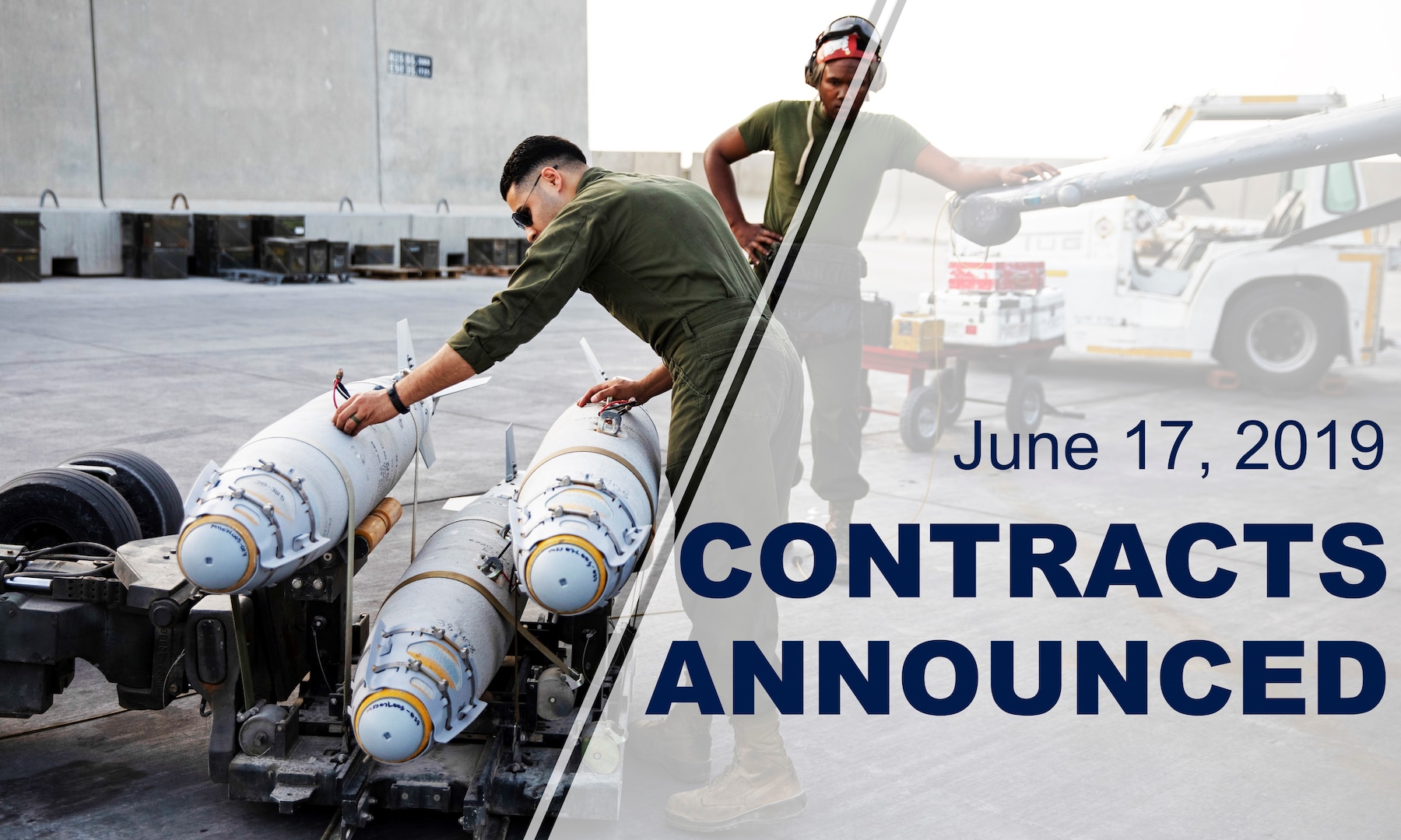 Two service members observe three missiles sitting on a transport crate. Words over photo reads: "June 17, 2019 Contracts Announced."