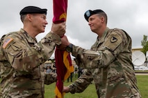 With the passing of the flag, Col. McDonald assumes his role at Tobyhanna Army Depot's 33rd commander.