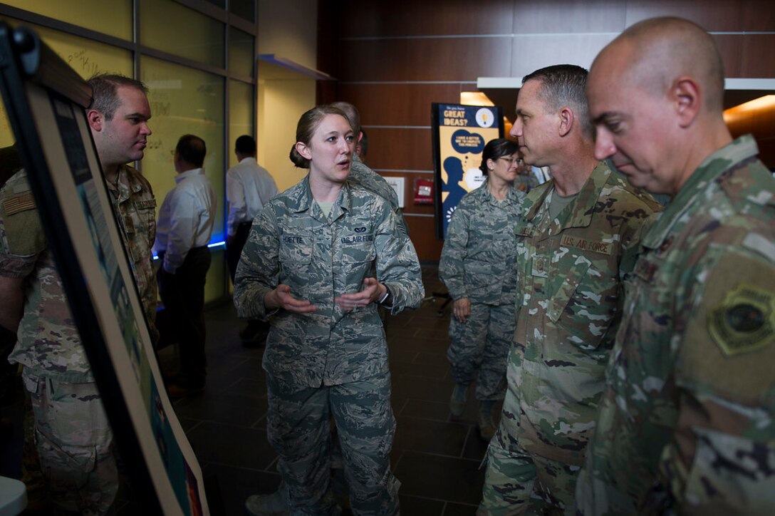 Staff Sgt. Trista Hoette, Air Force District of Washington protocol specialist, describes changes that were made to the visiting General Officers' Program during the first AFDW Innovation Summit at Joint Base Andrews, Md., June 12, 2019. (U.S. Air Force photo by Master Sgt. Michael B. Keller)
