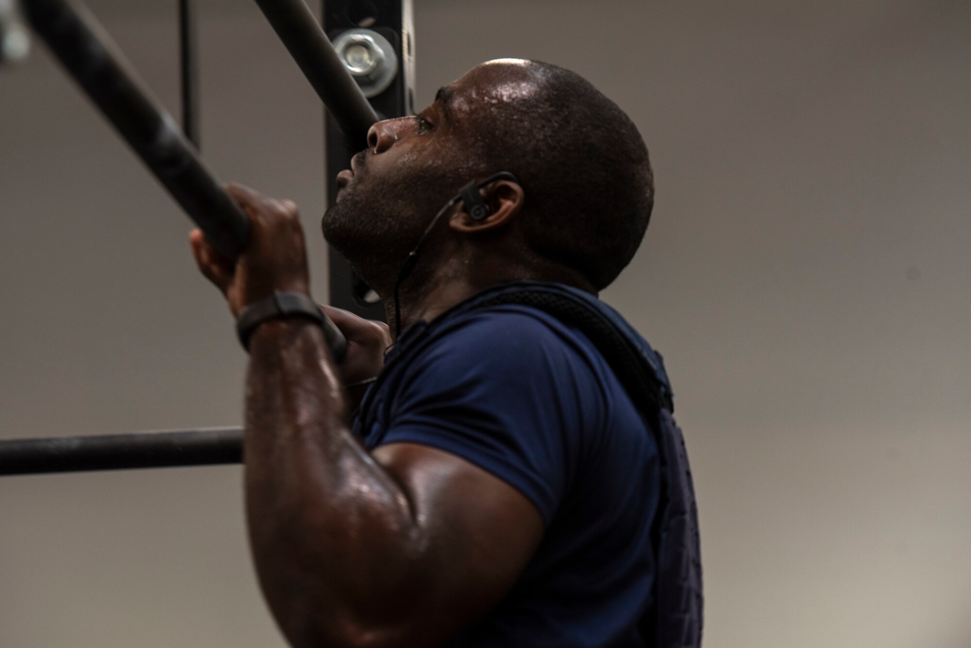 Cofie Asare, 20th Force Support Squadron golf course tournament and program coordinator, does a set of pull-ups during a “Murph challenge” at Shaw Air Force Base, South Carolina, May 28, 2019.