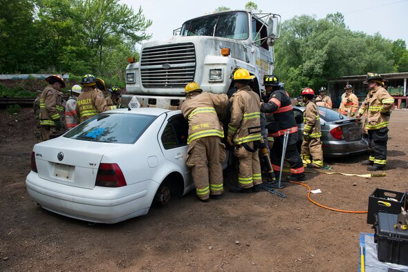 Fire Departments from Bloomfield, Blue Hills, East Granby, Suffield, and Bradley International Airport convened at Mark’s Auto Parts to participate in a rescue strike team exercise led by the Connecticut Air National Guard Fire Department, June 1, 2019 in East Granby, Conn. The firefighters practiced various rescue techniques to ensure continuity in training across departments. (U.S. Air National Guard photo by Tech. Sgt. Tamara R. Dabney)