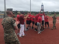 U.S. Marines with 2nd Maintenance Battalion, 2nd Marine Logistics Group (MLG), and 8th Engineer Support Battalion, 2nd MLG, participate in a softball competition at Camp Lejeune, North Carolina, June 12, 2019. The Big Six Softball Championship was the second of three events held by the MLG this year. (U.S. Marine Corps photo by courtesy asset)