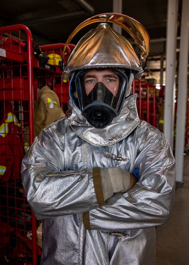 U.S. Marine Corps Lance Cpl. Michael Hubener, an aircraft rescue and firefighting specialist with Marine Wing Support Squadron 471, Marine Aircraft Group 41, 4th Marine Aircraft Wing, poses for a photo after a physical training test at Canadian Forces Base Cold Lake, Canada, June 14, 2019, in support of Sentinel Edge 19. Each portion of the test simulated tasks that every Reserve Marine with Aircraft Rescue and Firefighting would be expected to complete in a timely manner if an accident were to occur in an airfield. Reserve Marines with MAG-41 conducted the test to maintain job proficiency and ensure deployment readiness. (U.S. Marine Corps photo by Lance Cpl. Jose Gonzalez)