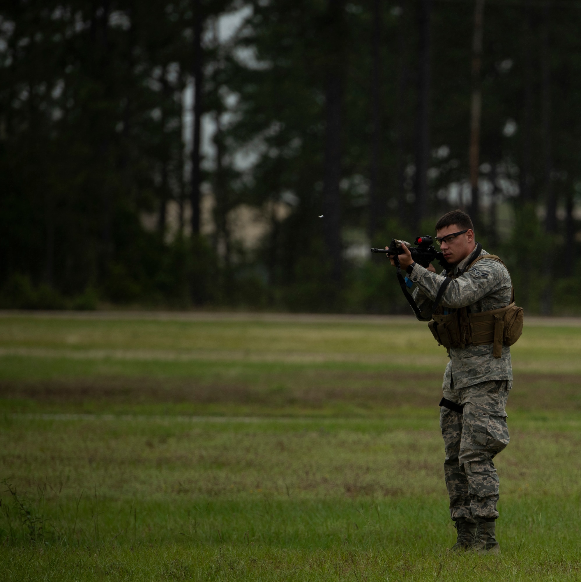 U.S. Air Force Staff Sgt. Dakota Williams, 20th Security Forces Squadron (SFS) installation entry controller, fires a weapon during training at Shaw Air Force Base, South Carolina, June 12, 2019.