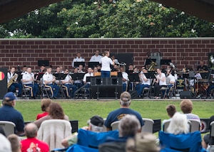 Band members from various Armed Forces bands team up for a collaborative performance during the “Music Under the Stars” concert series at Joint Base Langley-Eustis, Virginia, June 13, 2019.