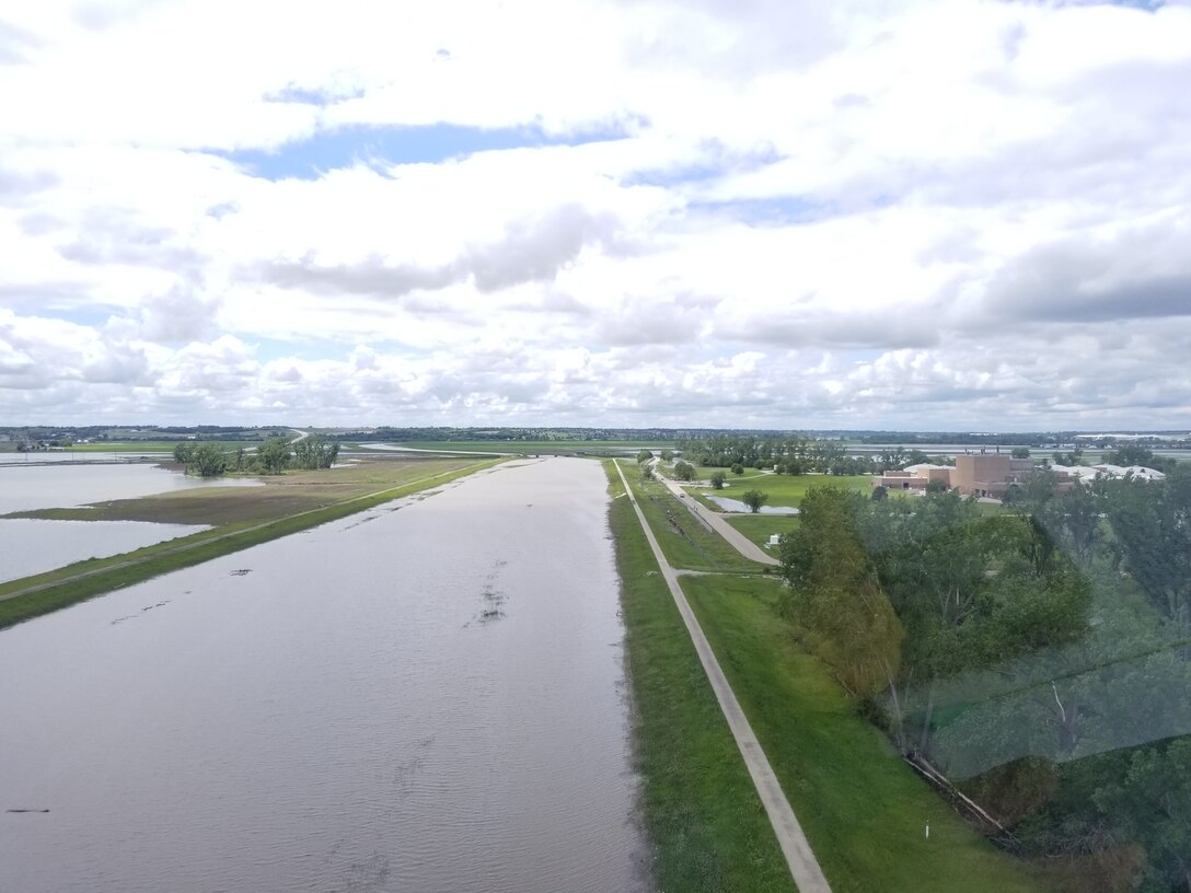 Image shows Levee R616-613 looking upstream on the Papillion Creek (west) from approximately the confluence of Big Papillion Creek with the Missouri River May 29, 2019.