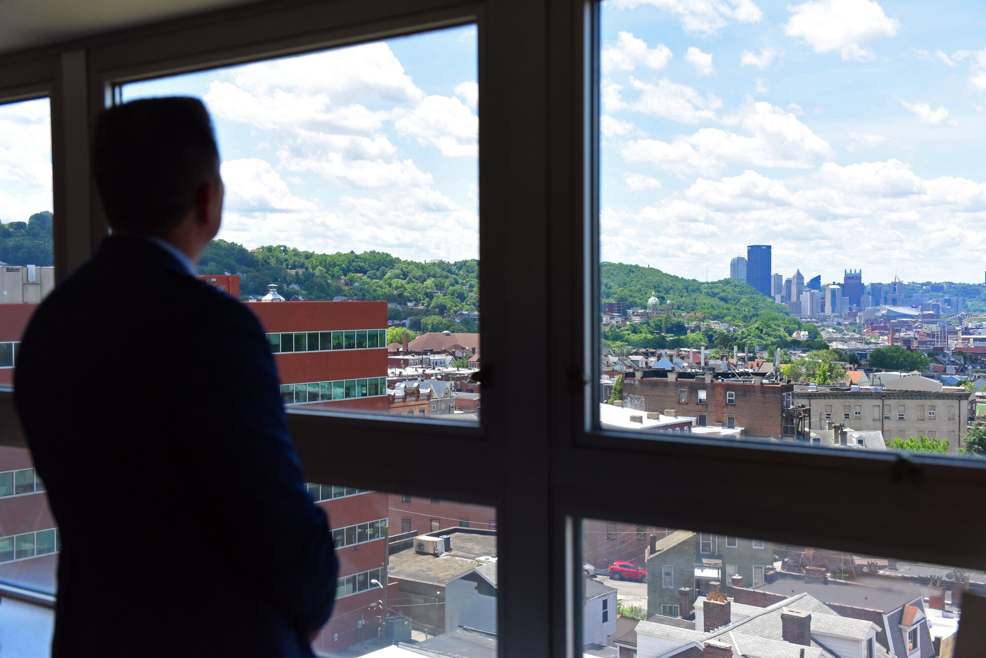 Lt. Gen. David Thompson, Air Force Space Command vice commander, observes downtown Pittsburgh, June 14, 2019.