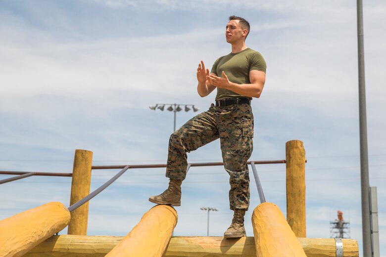 Students from Yuma Lutheran School and Desert Sonora Elementary School visit Marine Corps Air Station (MCAS) Yuma, Ariz., May 9, 2019. The students observed a demonstration of a military working dog, Marine Corps Martial Arts Program (MCMAP) techniques, and the Marine Corps Obstacle Course. They were also able to see various static displays ranging from a Search and Rescue (SAR) helicopter to a AV-8B Harrier. (U.S. Marine Corps photo by Cpl. Sabrina Candiaflores)