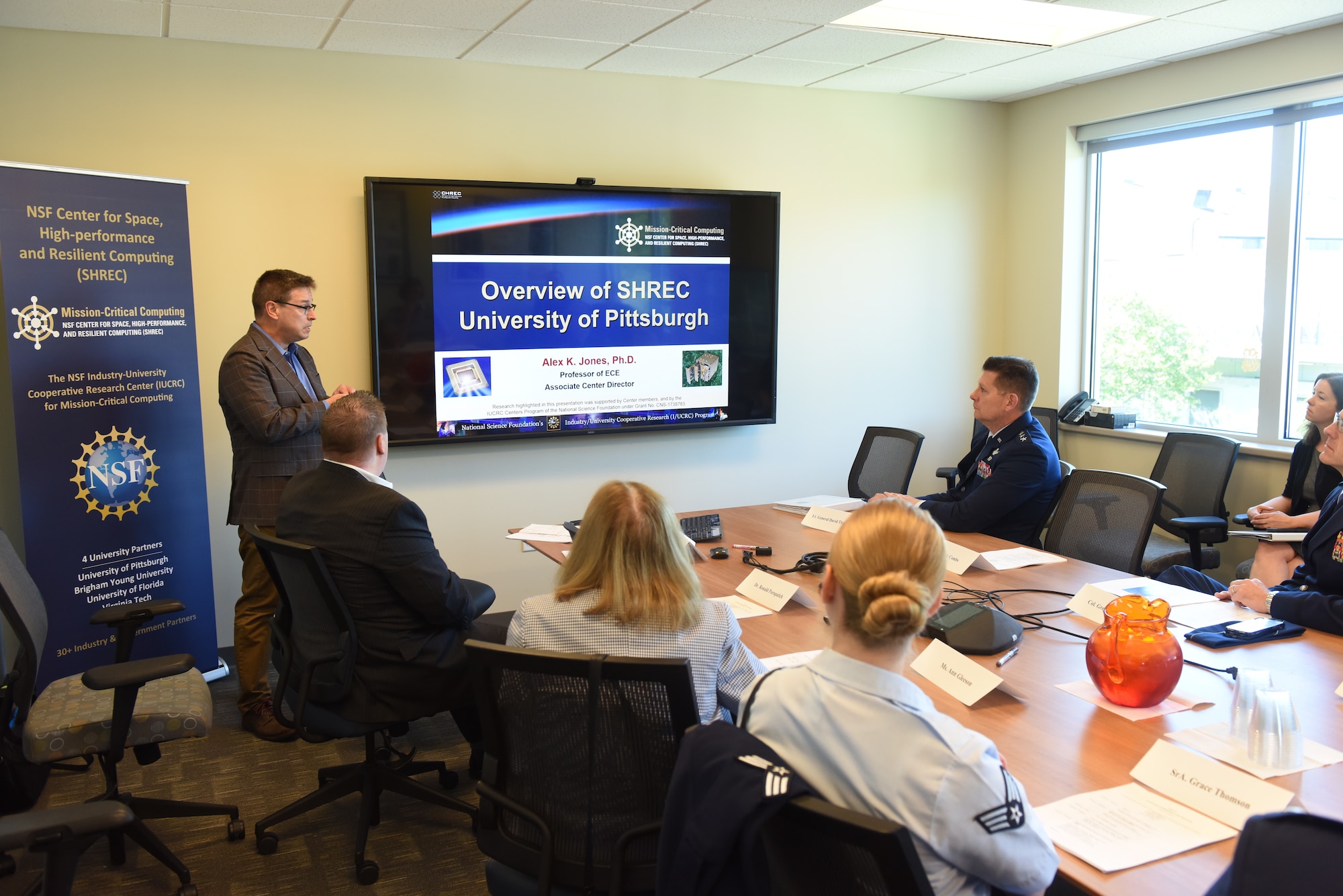 Professors with the University of Pittsburgh brief Lt. Gen. David Thompson, Air Force Space Command vice commander, on technological and medical research and development in Pittsburgh, June 14, 2019.