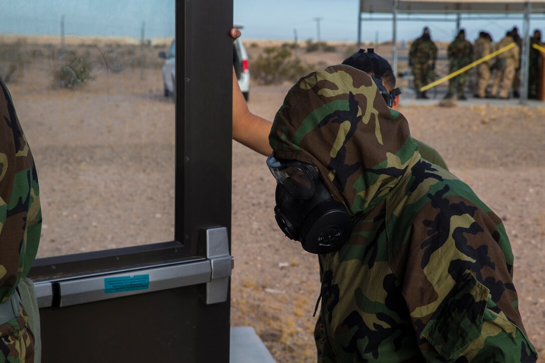 U.S. Marines stationed at Marine Corps Air Station (MCAS) Yuma, conduct their annual Chemical, Biological, Radiological, and Nuclear Defense (CBRN) training at MCAS Yuma, Ariz. Gas Chamber May 9, 2019. The gas chamber is a controlled environment in which a non-lethal gas is released, this trains Marines to have confidence in their gear and become familiar with the M50 Gas Mask and the effects of the gas. (U.S. Marine Corps photo by Pfc. John Hall)