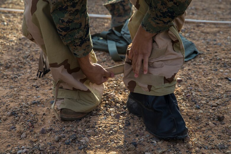 U.S. Marines stationed at Marine Corps Air Station (MCAS) Yuma, conduct their annual Chemical, Biological, Radiological, and Nuclear Defense (CBRN) training at MCAS Yuma, Ariz. Gas Chamber May 9, 2019. The gas chamber is a controlled environment in which a non-lethal gas is released, this trains Marines to have confidence in their gear and become familiar with the M50 Gas Mask and the effects of the gas. (U.S. Marine Corps photo by Pfc. John Hall)