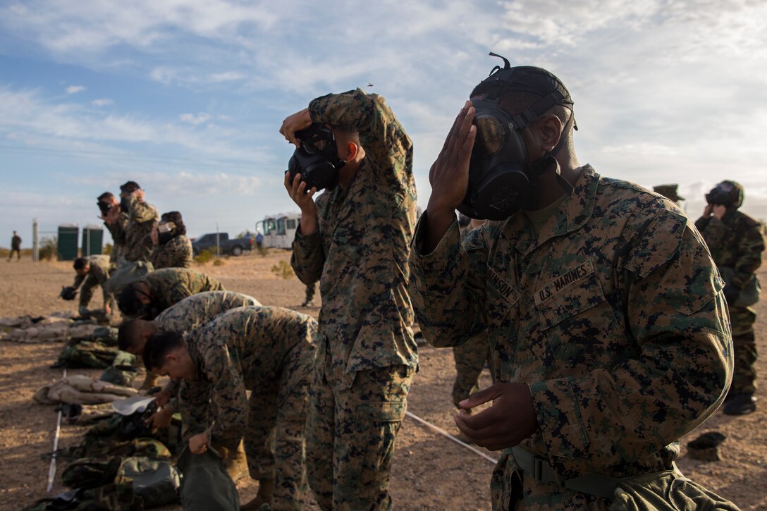 U.S. Marines stationed at Marine Corps Air Station (MCAS) Yuma, conduct their annual Chemical, Biological, Radiological, and Nuclear Defense (CBRN) training at MCAS Yuma, Ariz. Gas Chamber May 9, 2019. The gas chamber is a controlled environment in which a non-lethal gas is released, this trains Marines to have confidence in their gear and become familiar with the M50 Gas Mask and the effects of the gas. (U.S. Marine Corps photo by Pfc. John Hall)