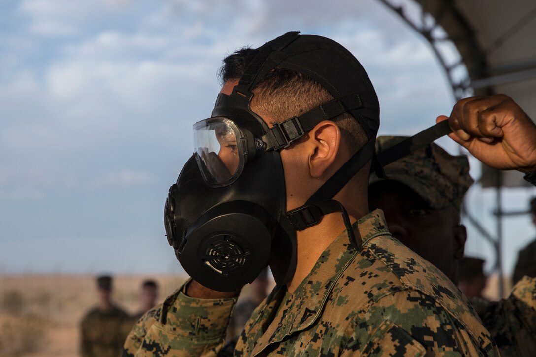 U.S. Marines stationed at Marine Corps Air Station (MCAS) Yuma, conduct their annual Chemical, Biological, Radiological, and Nuclear Defense (CBRN) training at MCAS Yuma, Ariz. Gas Chamber May 9, 2019. The gas chamber is a controlled environment in which a non-lethal gas is released, this trains Marines to have confidence in their gear and become familiar with the M50 Gas Mask and the effects of the gas. (U.S. Marine Corps photo by Pfc. John Hall)