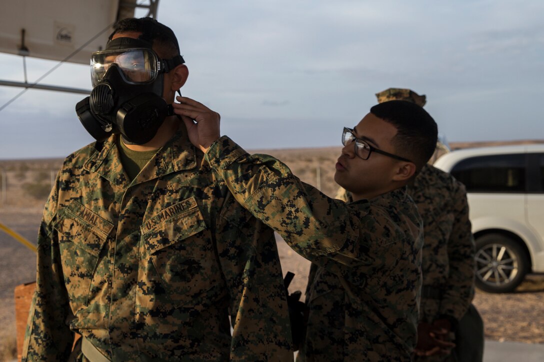 U.S. Marines stationed at Marine Corps Air Station (MCAS) Yuma, conduct their annual Chemical, Biological, Radiological, and Nuclear Defense (CBRN) training at MCAS Yuma, Ariz. Gas Chamber May 9, 2019. The gas chamber is a controlled environment in which a non-lethal gas is released, this trains Marines to have confidence in their gear and become familiar with the M50 Gas Mask and the effects of the gas. (U.S. Marine Corps photo by Pfc. John Hall)