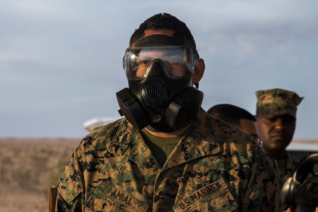 U.S. Marines stationed at Marine Corps Air Station (MCAS) Yuma, conduct their annual Chemical, Biological, Radiological, and Nuclear Defense (CBRN) training at MCAS Yuma, Ariz. Gas Chamber May 9, 2019. The gas chamber is a controlled environment in which a non-lethal gas is released, this trains Marines to have confidence in their gear and become familiar with the M50 Gas Mask and the effects of the gas. (U.S. Marine Corps photo by Pfc. John Hall)