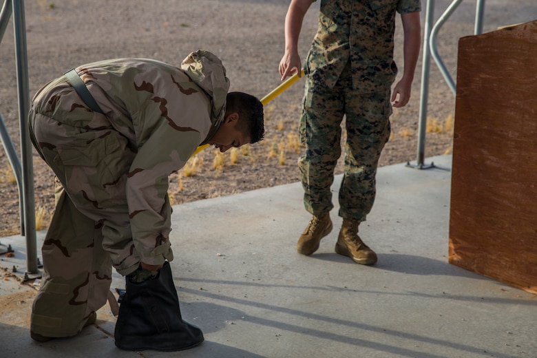 U.S. Marines stationed at Marine Corps Air Station (MCAS) Yuma, conduct their annual Chemical, Biological, Radiological, and Nuclear Defense (CBRN) training at MCAS Yuma, Ariz. Gas Chamber May 9, 2019. The gas chamber is a controlled environment in which a non-lethal gas is released, this trains Marines to have confidence in their gear and become familiar with the M50 Gas Mask and the effects of the gas. (U.S. Marine Corps photo by Pfc. John Hall)