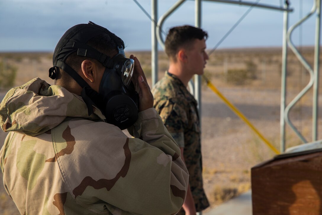 U.S. Marines stationed at Marine Corps Air Station (MCAS) Yuma, conduct their annual Chemical, Biological, Radiological, and Nuclear Defense (CBRN) training at MCAS Yuma, Ariz. Gas Chamber May 9, 2019. The gas chamber is a controlled environment in which a non-lethal gas is released, this trains Marines to have confidence in their gear and become familiar with the M50 Gas Mask and the effects of the gas. (U.S. Marine Corps photo by Pfc. John Hall)