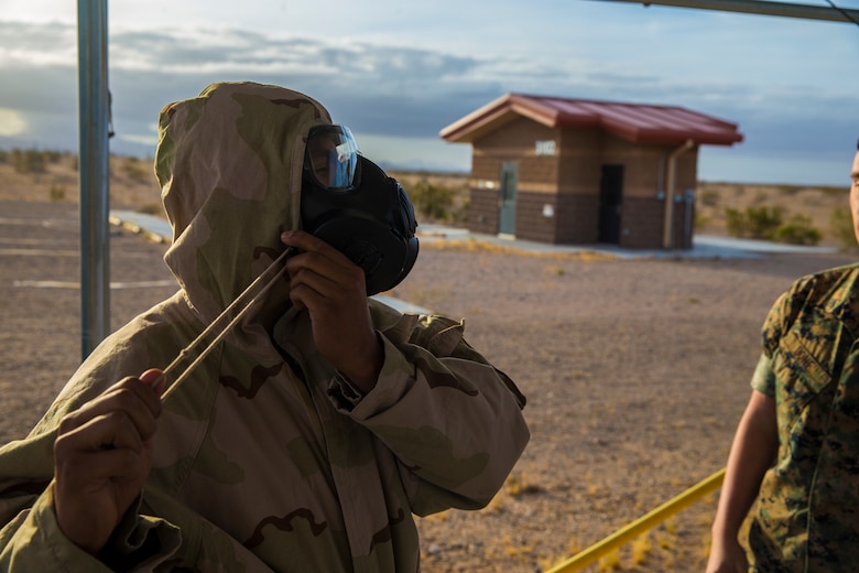 U.S. Marines stationed at Marine Corps Air Station (MCAS) Yuma, conduct their annual Chemical, Biological, Radiological, and Nuclear Defense (CBRN) training at MCAS Yuma, Ariz. Gas Chamber May 9, 2019. The gas chamber is a controlled environment in which a non-lethal gas is released, this trains Marines to have confidence in their gear and become familiar with the M50 Gas Mask and the effects of the gas. (U.S. Marine Corps photo by Pfc. John Hall)