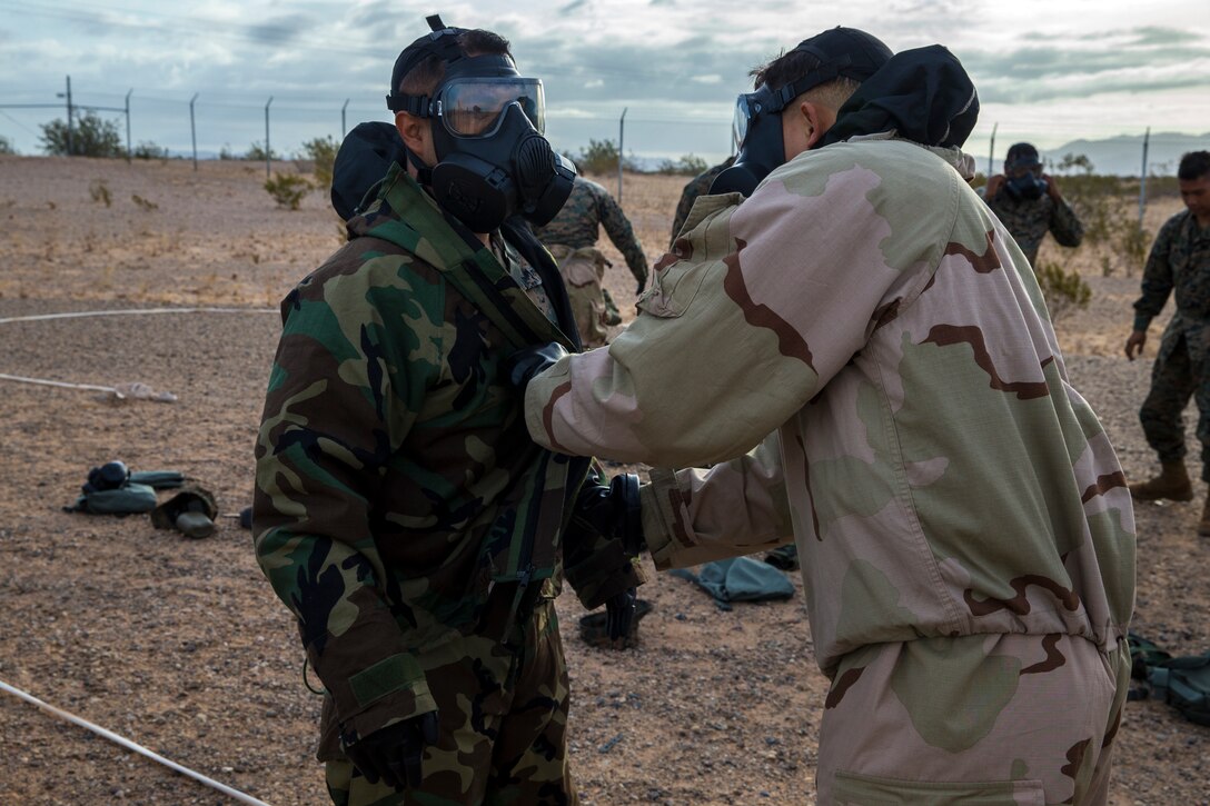 U.S. Marines stationed at Marine Corps Air Station (MCAS) Yuma, conduct their annual Chemical, Biological, Radiological, and Nuclear Defense (CBRN) training at MCAS Yuma, Ariz. Gas Chamber May 9, 2019. The gas chamber is a controlled environment in which a non-lethal gas is released, this trains Marines to have confidence in their gear and become familiar with the M50 Gas Mask and the effects of the gas. (U.S. Marine Corps photo by Pfc. John Hall)