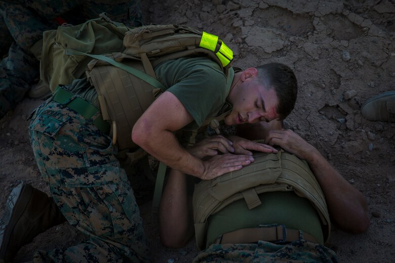 U.S. Marines stationed at Marine Corps Air Station (MCAS) Yuma conduct a Casualty Evacuation run as part of their physical training during Corporals Course at MCAS Yuma, Ariz., May 15, 2019. Corporals Course is a leadership class designed to teach Marines the fundamentals of being a noncomissioned officer. (U.S. Marine Corps photo by Pfc. John Hall)