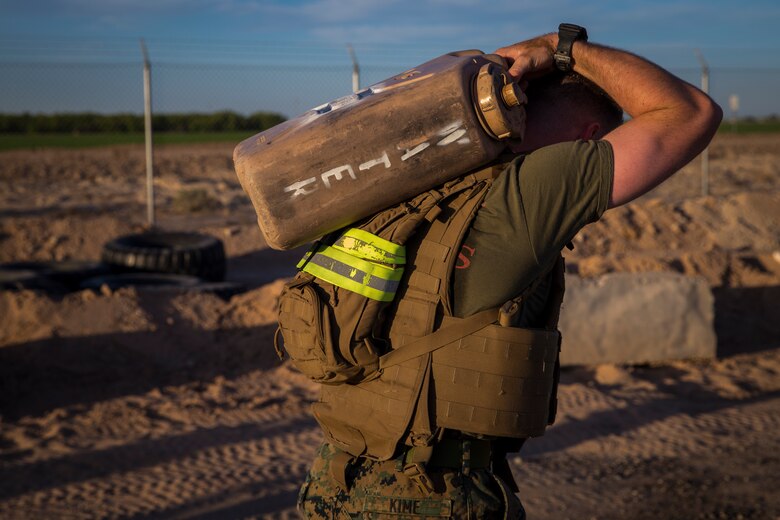 U.S. Marines stationed at Marine Corps Air Station (MCAS) Yuma conduct a Casualty Evacuation run as part of their physical training during Corporals Course at MCAS Yuma, Ariz., May 15, 2019. Corporals Course is a leadership class designed to teach Marines the fundamentals of being a noncomissioned officer. (U.S. Marine Corps photo by Pfc. John Hall)